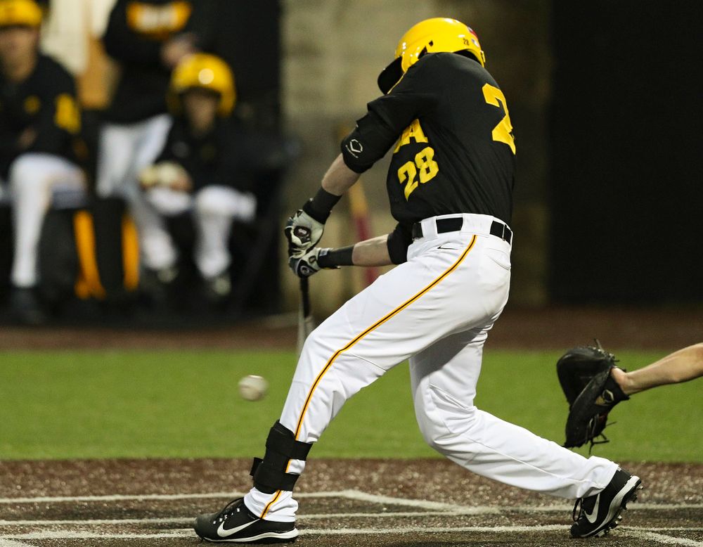 Iowa Hawkeyes left fielder Chris Whelan (28) hits an RBI single during the sixth inning of their game against Western Illinois at Duane Banks Field in Iowa City on Wednesday, May. 1, 2019. (Stephen Mally/hawkeyesports.com)