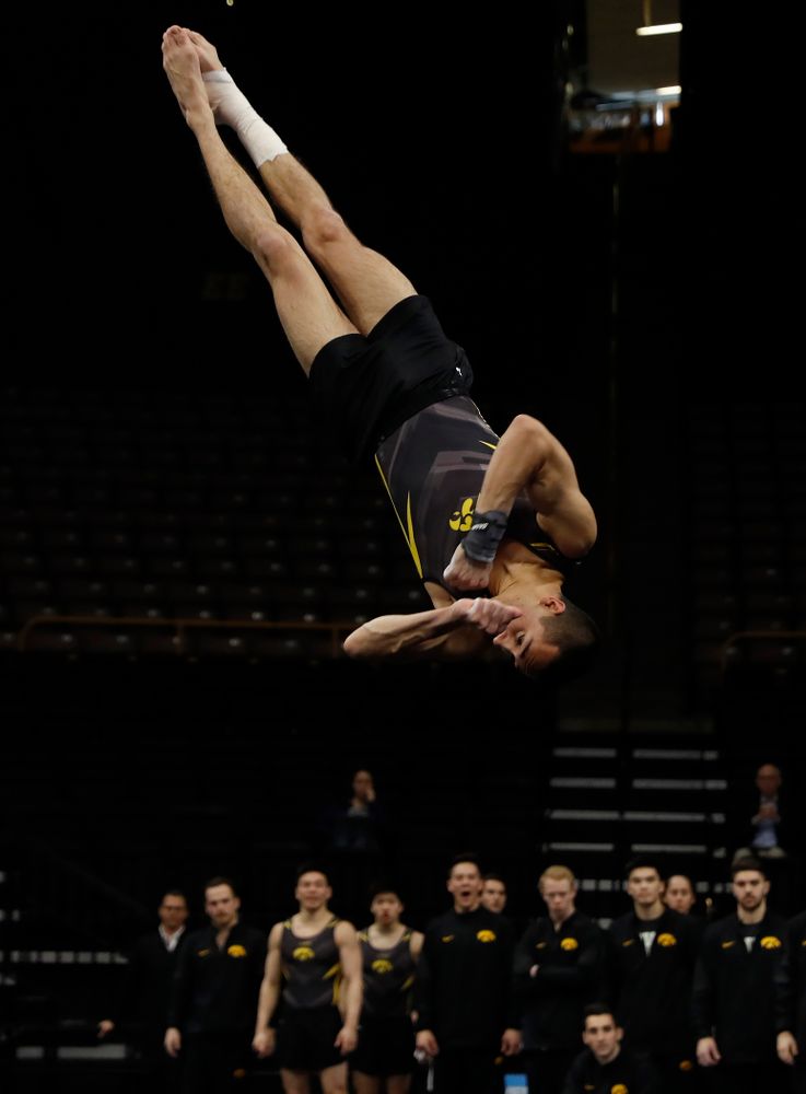 Andrew Herrador competes on the floor against Minnesota and Air Force 