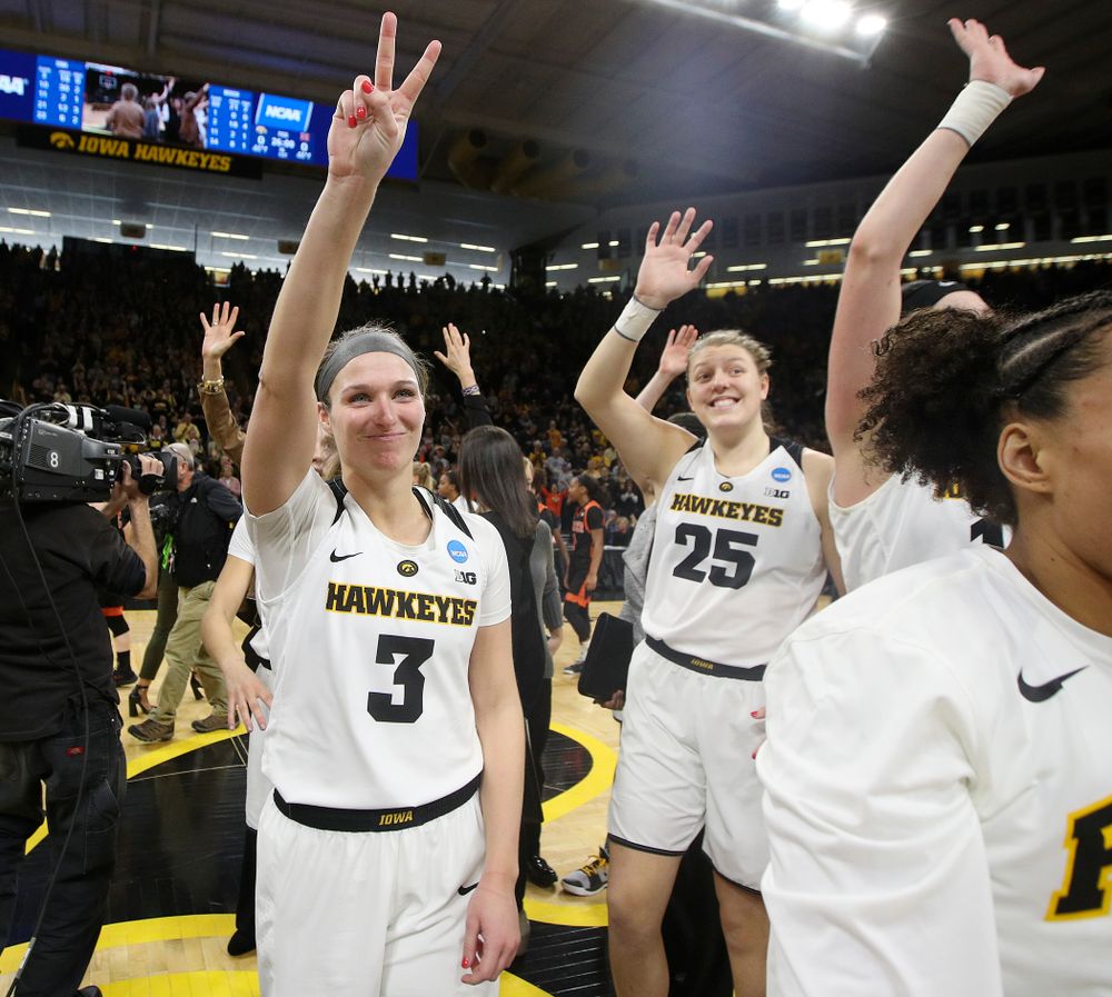 Iowa Hawkeyes guard Makenzie Meyer (3) points to the crowd after winning their game during the first round of the 2019 NCAA Women's Basketball Tournament at Carver Hawkeye Arena in Iowa City on Friday, Mar. 22, 2019. (Stephen Mally for hawkeyesports.com)