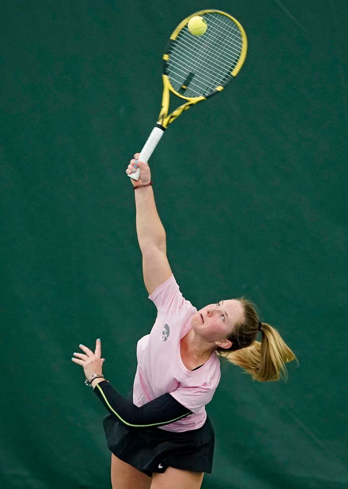 Iowa's Danielle Burich serves during her match against Purdue at the Hawkeye Tennis and Recreation Complex in Iowa City on Friday, Mar. 29, 2019. (Stephen Mally/hawkeyesports.com)
