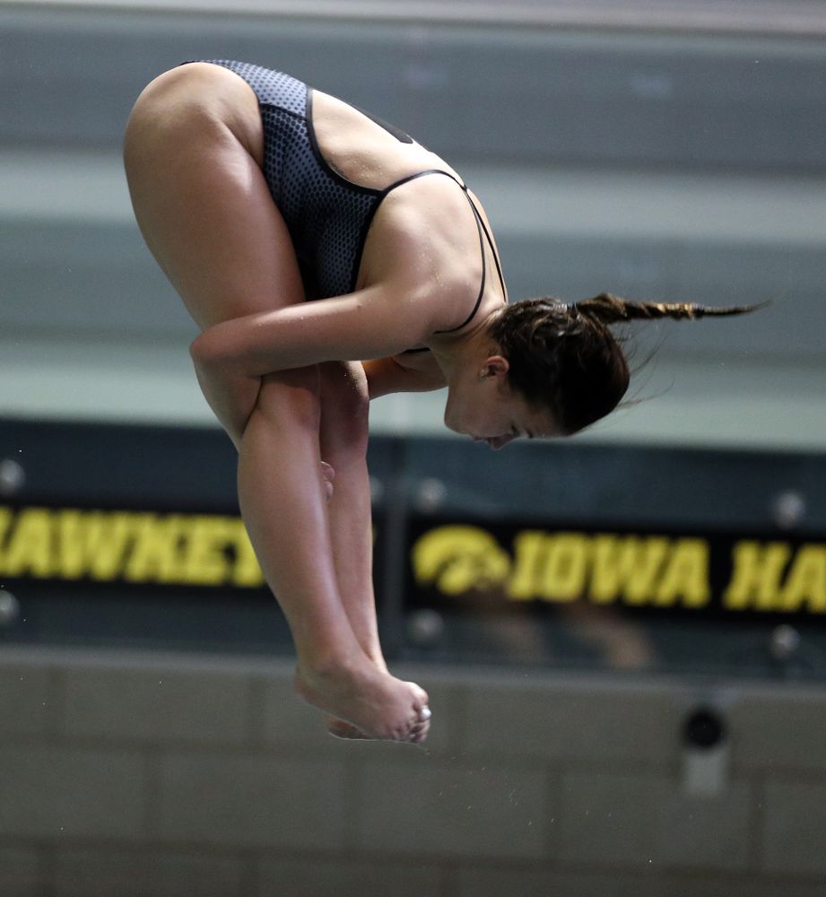 IowaÕs Jayah Mathews competes on the 1-meter springboard against the Michigan Wolverines Friday, November 1, 2019 at the Campus Recreation and Wellness Center. (Brian Ray/hawkeyesports.com)