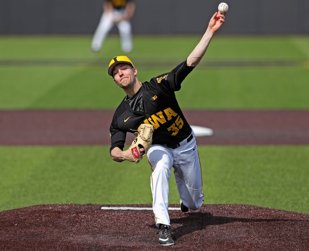 Iowa Hawkeyes pitcher Cam Baumann (35) delivers to the plate during the sixth inning of their game against Rutgers at Duane Banks Field in Iowa City on Saturday, Apr. 6, 2019. (Stephen Mally/hawkeyesports.com)