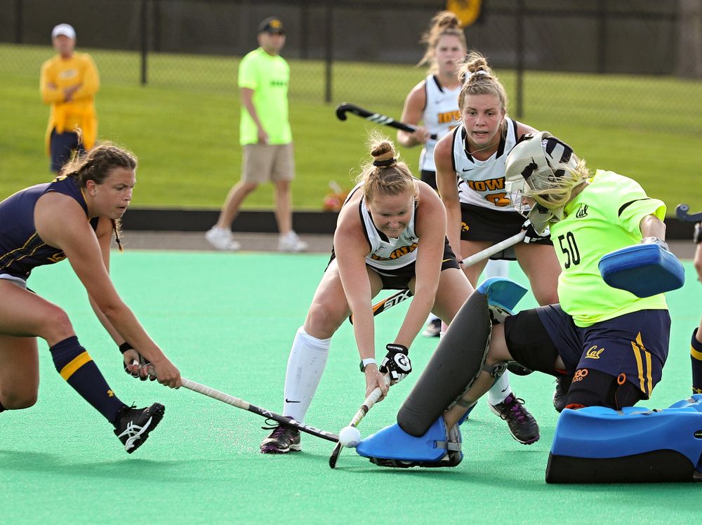 Iowa’s Makenna Maguire (21) tries to get the ball past the Cal goalkeeper as Nikki Freeman (8) looks on during the third quarter of their game at Grant Field in Iowa City on Friday, Sep 13, 2019. (Stephen Mally/hawkeyesports.com)