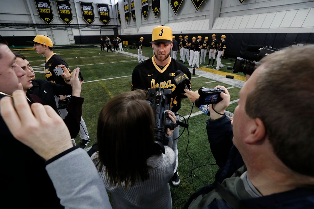Iowa Hawkeyes pitcher Nick Allgeyer (24) answers questions from reporters during the team's annual media day Thursday, February 8, 2018 in the indoor practice facility. (Brian Ray/hawkeyesports.com)