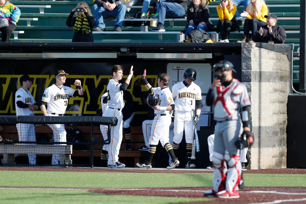 Iowa Hawkeyes infielder Mitchell Boe (4) and infielder Kyle Crowl (23) against Northern Illinois Tuesday, April 17, 2018 at Duane Banks Field. (Brian Ray/hawkeyesports.com)