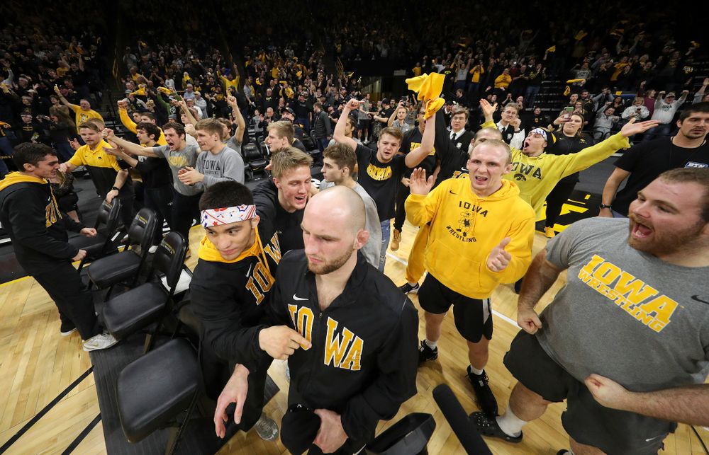 The Iowa bench celebrates during the closing seconds of Tony Cassioppi’s 7-0 win over Penn State’s Seth Nevills in their dual at Carver-Hawkeye Arena in Iowa City on Friday, January 31, 2020. (Stephen Mally/hawkeyesports.com)
