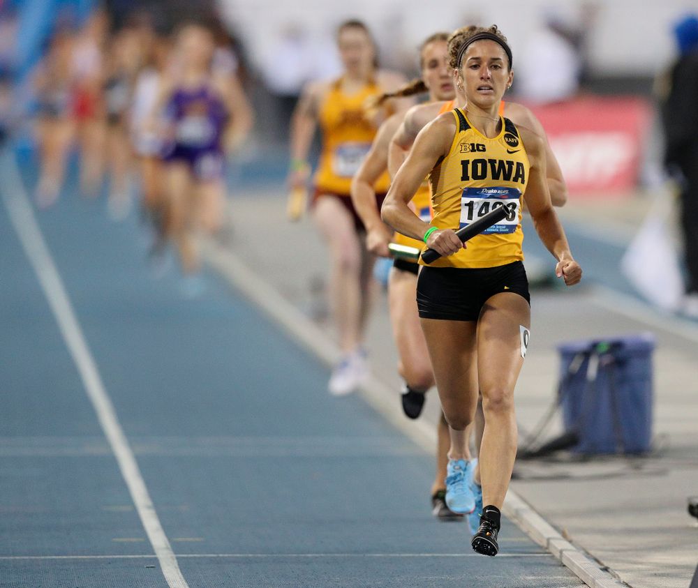 Iowa's Tia Saunders runs the women's 3200 meter relay event during the second day of the Drake Relays at Drake Stadium in Des Moines on Friday, Apr. 26, 2019. (Stephen Mally/hawkeyesports.com)