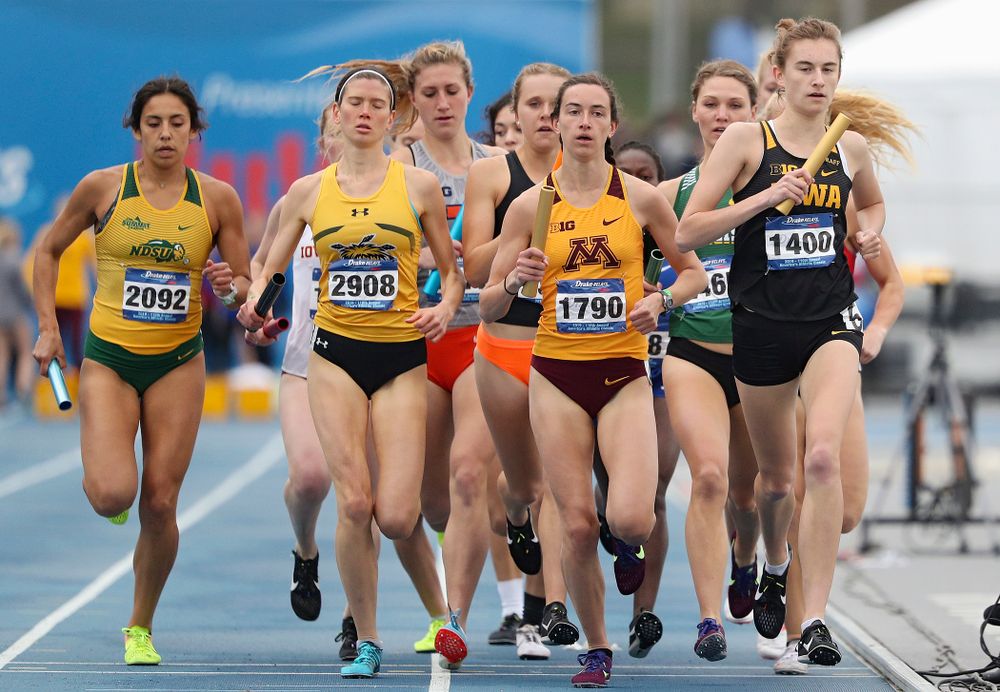 Iowa's Grace McCabe runs the women's distance medley relay event during the third day of the Drake Relays at Drake Stadium in Des Moines on Saturday, Apr. 27, 2019. (Stephen Mally/hawkeyesports.com)