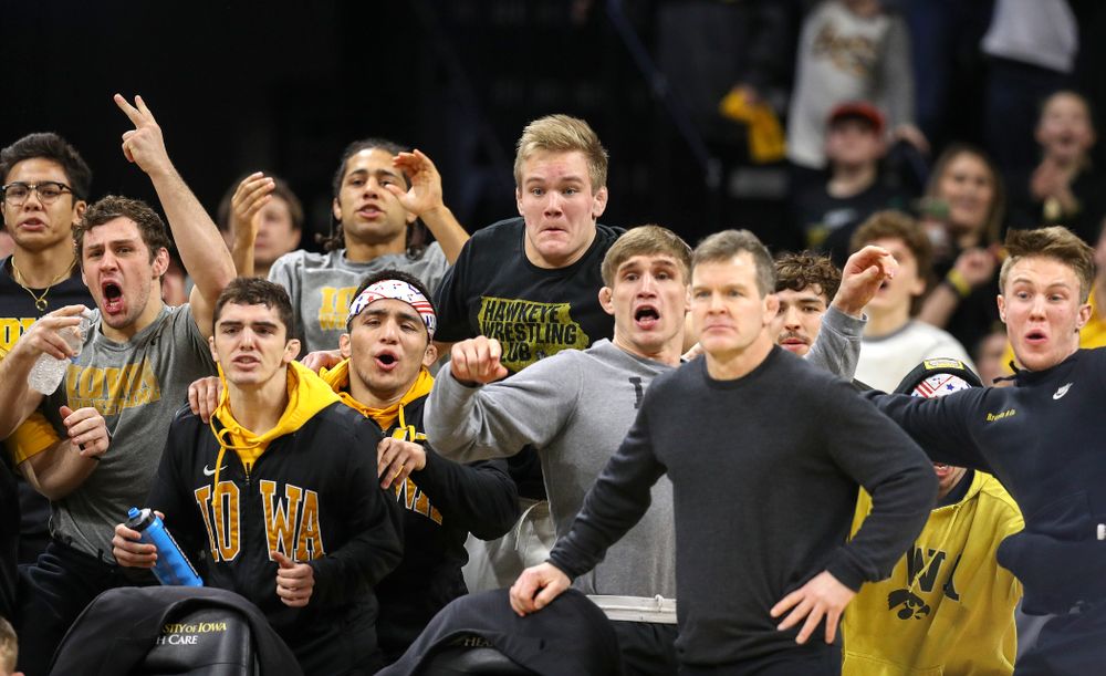 The Iowa bench cheers on cheers on Michael Kemerer in his 174-pound match during their dual at Carver-Hawkeye Arena in Iowa City on Friday, January 31, 2020. (Stephen Mally/hawkeyesports.com)