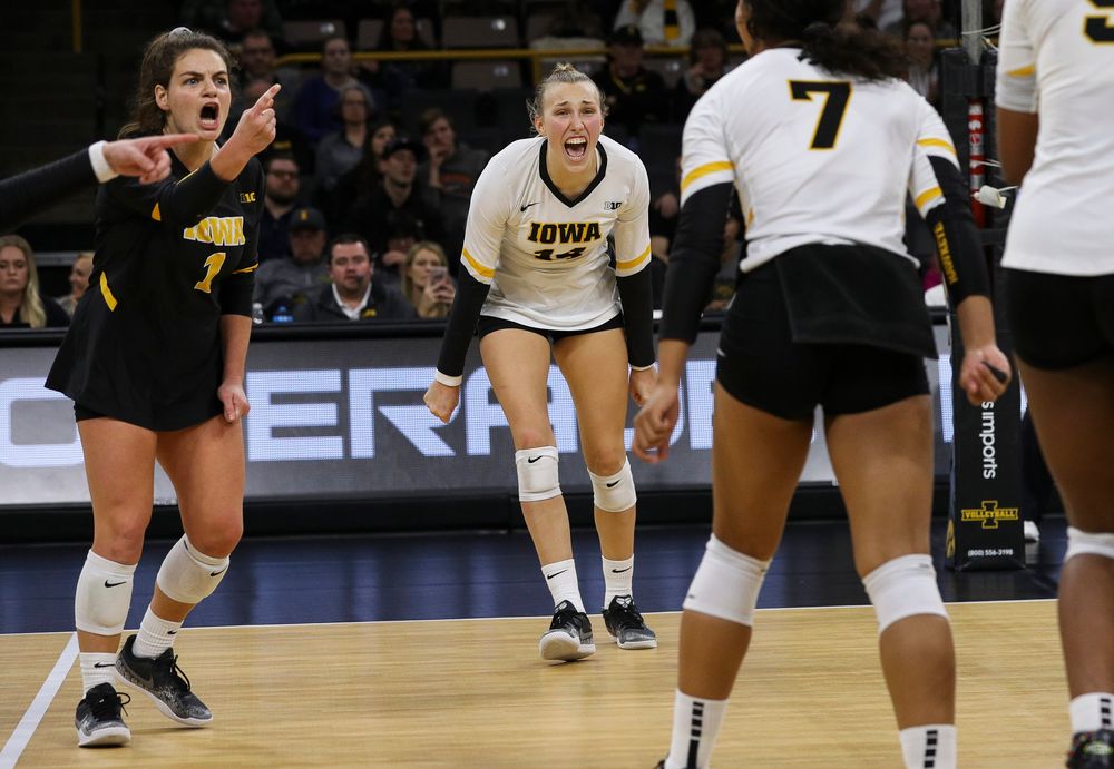Iowa Hawkeyes defensive specialist Molly Kelly (1) and Iowa Hawkeyes outside hitter Cali Hoye (14) celebrate after winning a point during a match against Rutgers at Carver-Hawkeye Arena on November 2, 2018. (Tork Mason/hawkeyesports.com)
