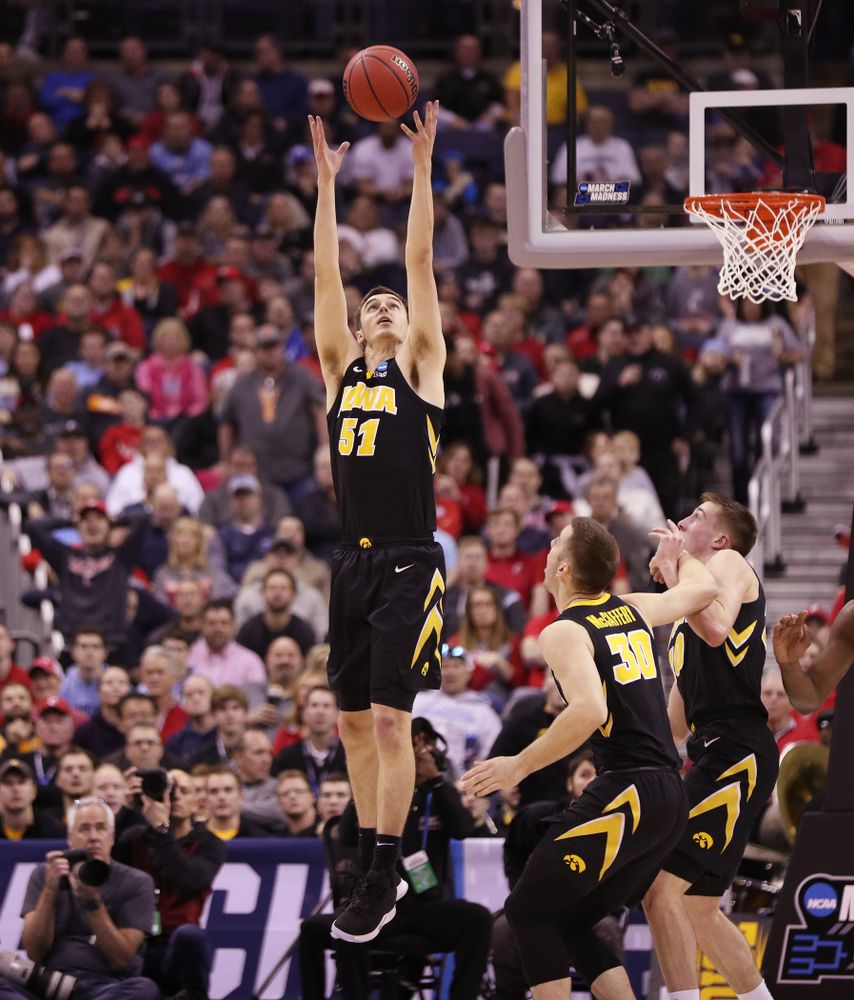 Iowa Hawkeyes forward Nicholas Baer (51) against the Cincinnati Bearcats in the first round of the 2019 NCAA Men's Basketball Tournament Friday, March 22, 2019 at Nationwide Arena in Columbus, Ohio. (Brian Ray/hawkeyesports.com)
