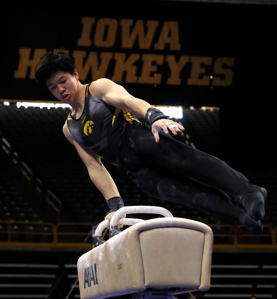 Bennet Huang competes on the pommel horse  against Minnesota and Air Force 