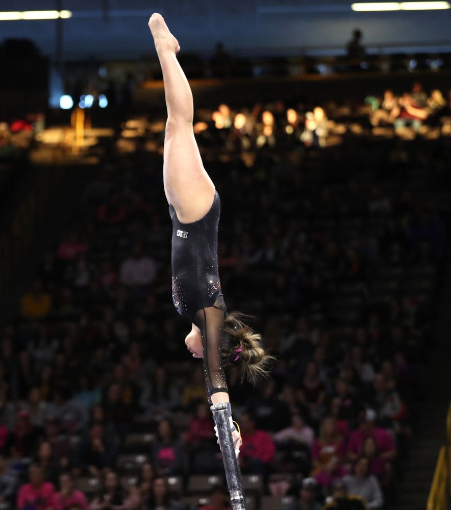 Iowa's Nicole Chow competes on the bars during their meet against the Minnesota Golden Gophers Saturday, January 19, 2019 at Carver-Hawkeye Arena. (Brian Ray/hawkeyesports.com)