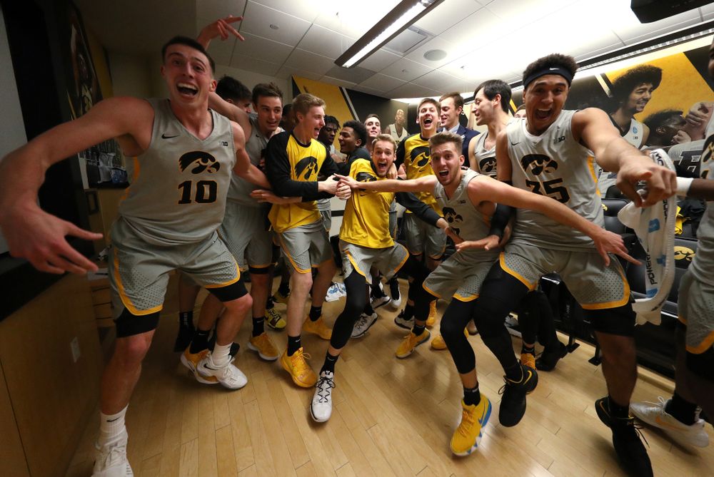 The Iowa Hawkeyes celebrate their victory against the Iowa State Cyclones in the Iowa Corn Cy-Hawk Series Thursday, December 6, 2018 at Carver-Hawkeye Arena. (Brian Ray/hawkeyesports.com)