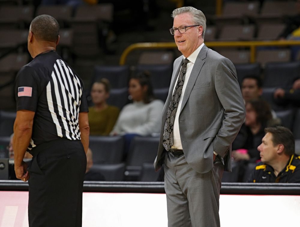 Iowa Hawkeyes head coach Fran McCaffery smiles as he talks with an official during the second half of their exhibition game against Lindsey Wilson College at Carver-Hawkeye Arena in Iowa City on Monday, Nov 4, 2019. (Stephen Mally/hawkeyesports.com)