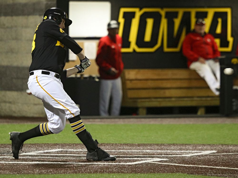 Iowa designated hitter Trenton Wallace (38) hits a home run during the eighth inning of their game at Duane Banks Field in Iowa City on Tuesday, March 3, 2020. (Stephen Mally/hawkeyesports.com)