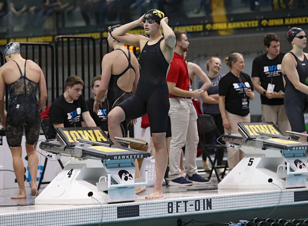 Iowa’s Hannah Burvill waits to swim the women’s 100 yard freestyle consolation final event during the 2020 Women’s Big Ten Swimming and Diving Championships at the Campus Recreation and Wellness Center in Iowa City on Saturday, February 22, 2020. (Stephen Mally/hawkeyesports.com)