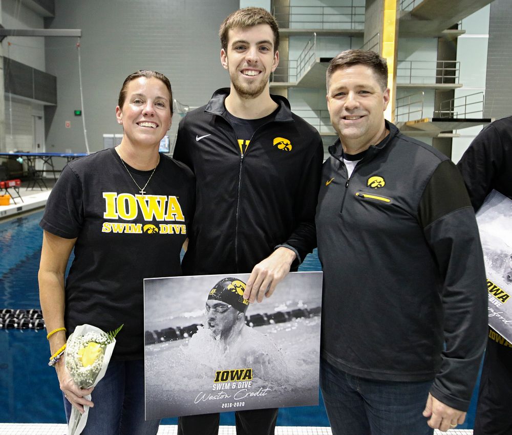 Iowa’s Weston Credit is honored on senior day before their meet at the Campus Recreation and Wellness Center in Iowa City on Friday, February 7, 2020. (Stephen Mally/hawkeyesports.com)