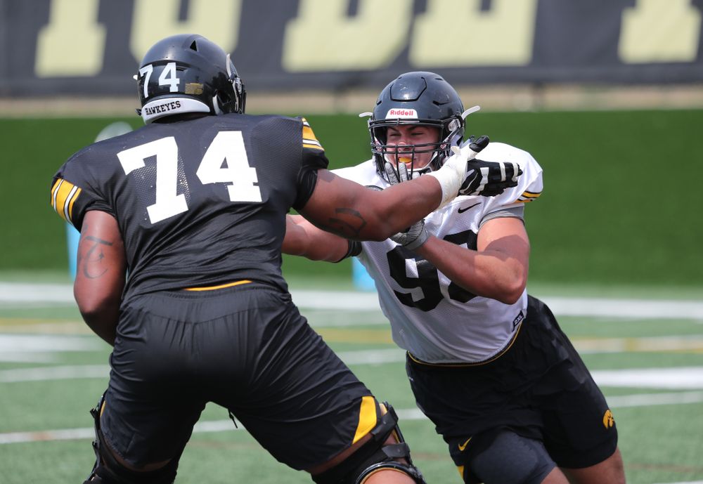 Iowa Hawkeyes defensive end Anthony Nelson (98) vs offensive lineman Tristan Wirfs (74) during the third practice of fall camp Sunday, August 5, 2018 at the Kenyon Football Practice Facility. (Brian Ray/hawkeyesports.com)