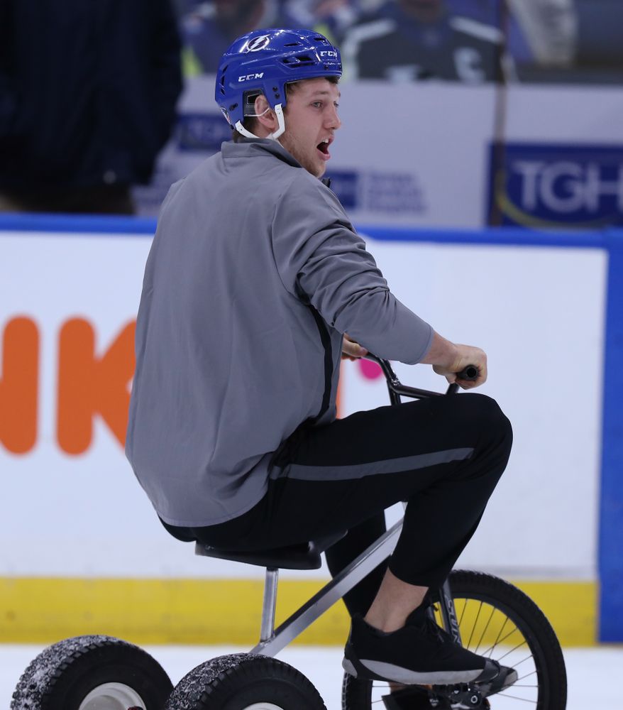 tight end T.J. Hockenson (38) rides a tricycle during a contest against Mississippi State during the first intermission of the Tampa Bay Lightning game Thursday, December 27, 2018 at Amalie Arena. (Brian Ray/hawkeyesports.com)