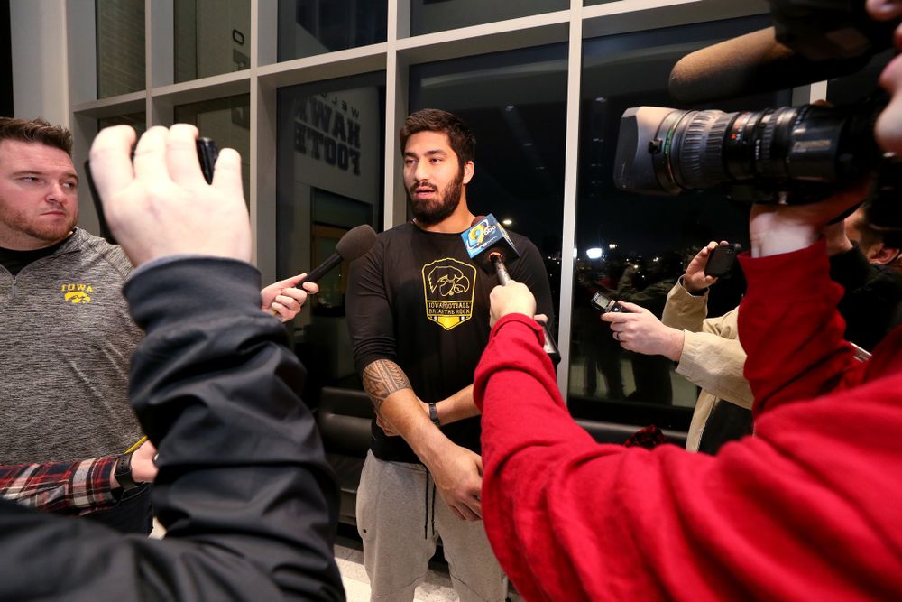 Iowa Hawkeyes defensive end A.J. Epenesa (94) answers questions from the media on the Hawkeyes selection to face USC in the 2019 Holiday Bowl Sunday, December 8, 2019 at the Hansen Football Performance Center. (Brian Ray/hawkeyesports.com)