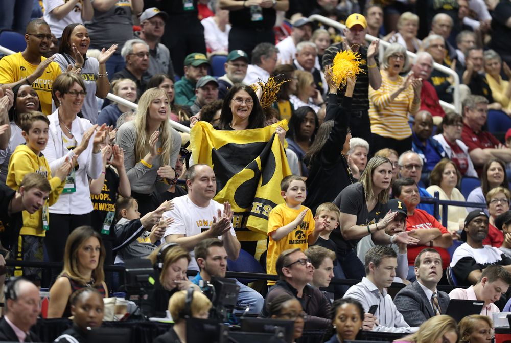 Fans cheer on the Iowa Hawkeyes against the NC State Wolfpack in the regional semi-final of the 2019 NCAA Women's College Basketball Tournament Saturday, March 30, 2019 at Greensboro Coliseum in Greensboro, NC.(Brian Ray/hawkeyesports.com)