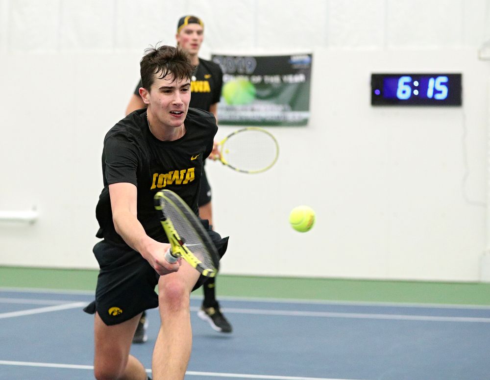 Iowa’s Matt Clegg returns a shot during his doubles match at the Hawkeye Tennis and Recreation Complex in Iowa City on Friday, February 14, 2020. (Stephen Mally/hawkeyesports.com)