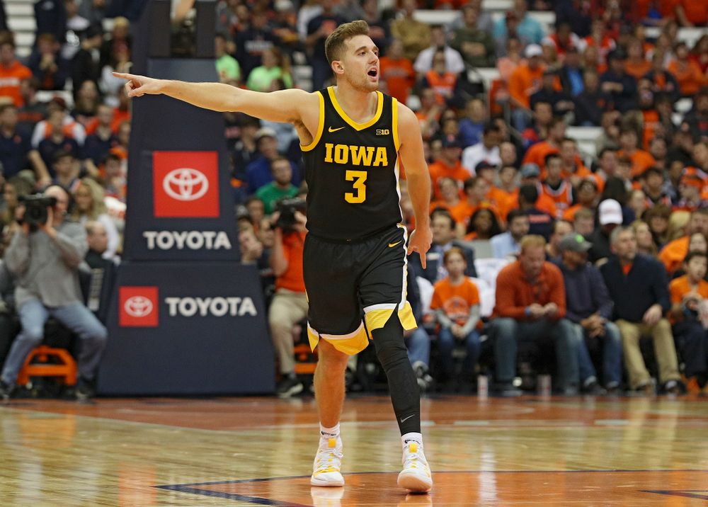 Iowa Hawkeyes guard Jordan Bohannon (3) directs his teammates during the second half of their ACC/Big Ten Challenge game at the Carrier Dome in Syracuse, N.Y. on Tuesday, Dec 3, 2019. (Stephen Mally/hawkeyesports.com)