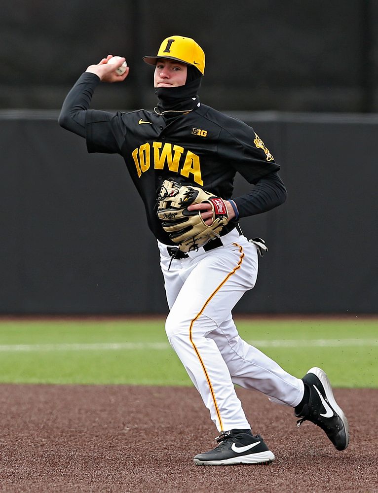 Iowa Hawkeyes third baseman infielder Brendan Sher (2) throws to first for an out during the first inning of their game against Illinois at Duane Banks Field in Iowa City on Saturday, Mar. 30, 2019. (Stephen Mally/hawkeyesports.com)