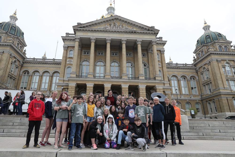 Iowa’s Megan Gustafson takes photos with a group of students on a field trip as she leaves the Iowa State Capitol Wednesday, April 24, 2019 in Des Moines. (Brian Ray/hawkeyesports.com)