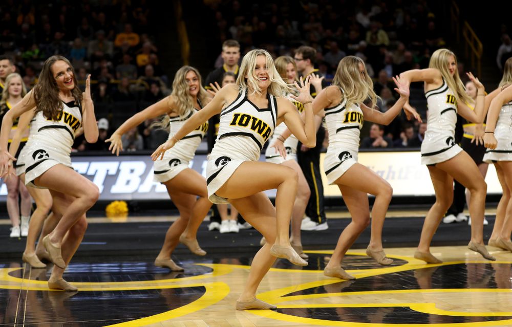 The Iowa Cheerleaders and Dance Team perform on senior night at half-time of the Iowa Hawkeyes game against the Purdue Boilermakers Tuesday, March 3, 2020 at Carver-Hawkeye Arena. (Brian Ray/hawkeyesports.com)