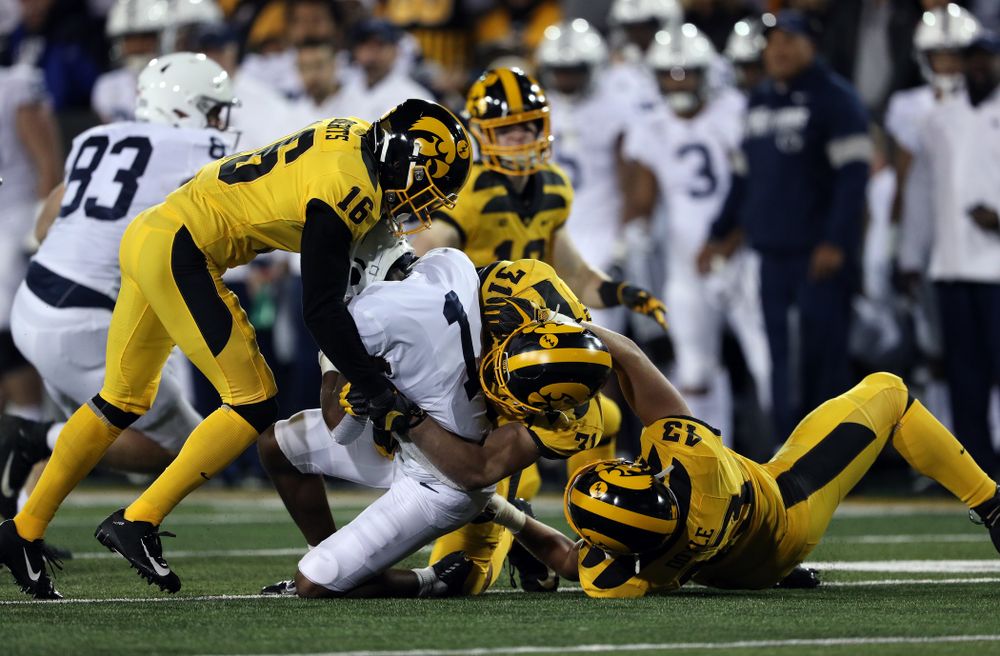 Iowa Hawkeyes defensive back Terry Roberts (16), linebacker Jack Campbell (31), and linebacker Dillon Doyle (43) against the Penn State Nittany Lions Saturday, October 12, 2019 at Kinnick Stadium. (Brian Ray/hawkeyesports.com)
