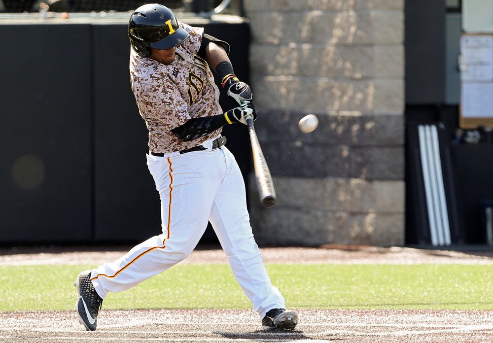 Iowa Hawkeyes second baseman Izaya Fullard (20) hits a sacrifice fly during the seventh inning of their game against UC Irvine at Duane Banks Field in Iowa City on Sunday, May. 5, 2019. (Stephen Mally/hawkeyesports.com)