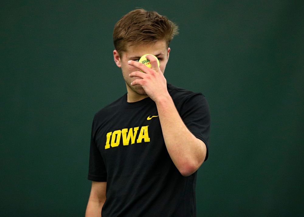 Iowa’s Will Davies prepares to serve during his singles match at the Hawkeye Tennis and Recreation Complex in Iowa City on Friday, March 6, 2020. (Stephen Mally/hawkeyesports.com)