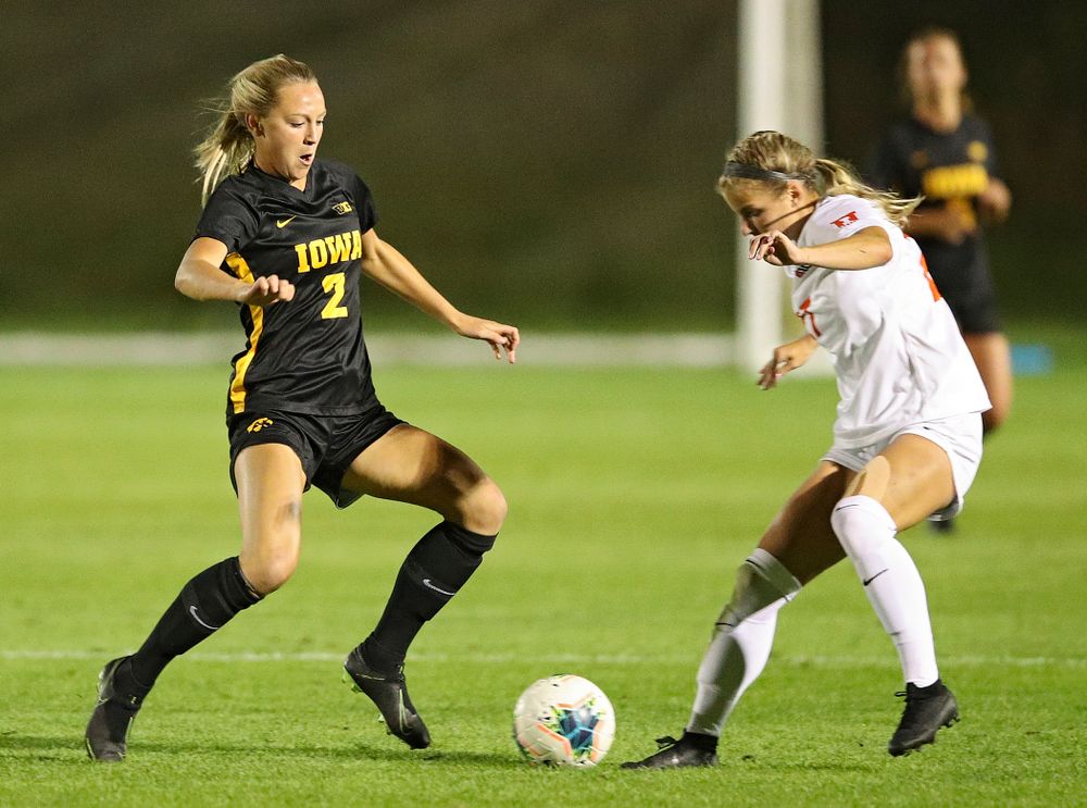 Iowa midfielder Hailey Rydberg (2) battles for position on the ball during the first half of their match against Illinois at the Iowa Soccer Complex in Iowa City on Thursday, Sep 26, 2019. (Stephen Mally/hawkeyesports.com)