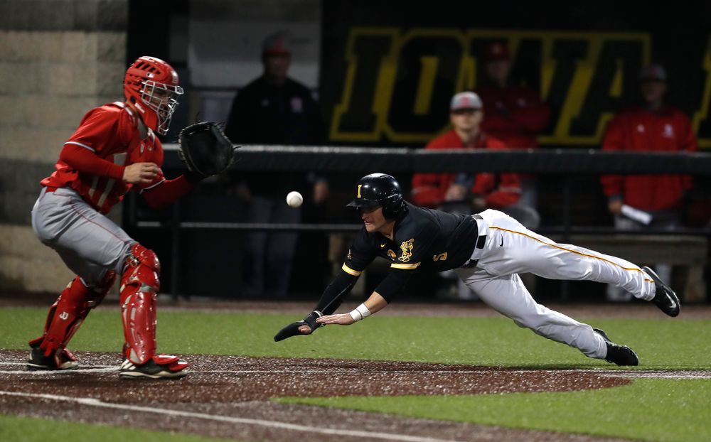 Iowa Hawkeyes catcher Tyler Cropley (5) scores against the Bradley Braves Wednesday, March 28, 2018 at Duane Banks Field. (Brian Ray/hawkeyesports.com)