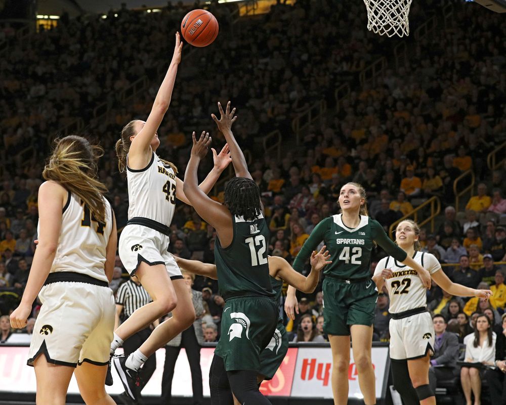 Iowa Hawkeyes forward Amanda Ollinger (43) makes a basket while being fouled during the fourth quarter of their game at Carver-Hawkeye Arena in Iowa City on Sunday, January 26, 2020. (Stephen Mally/hawkeyesports.com)