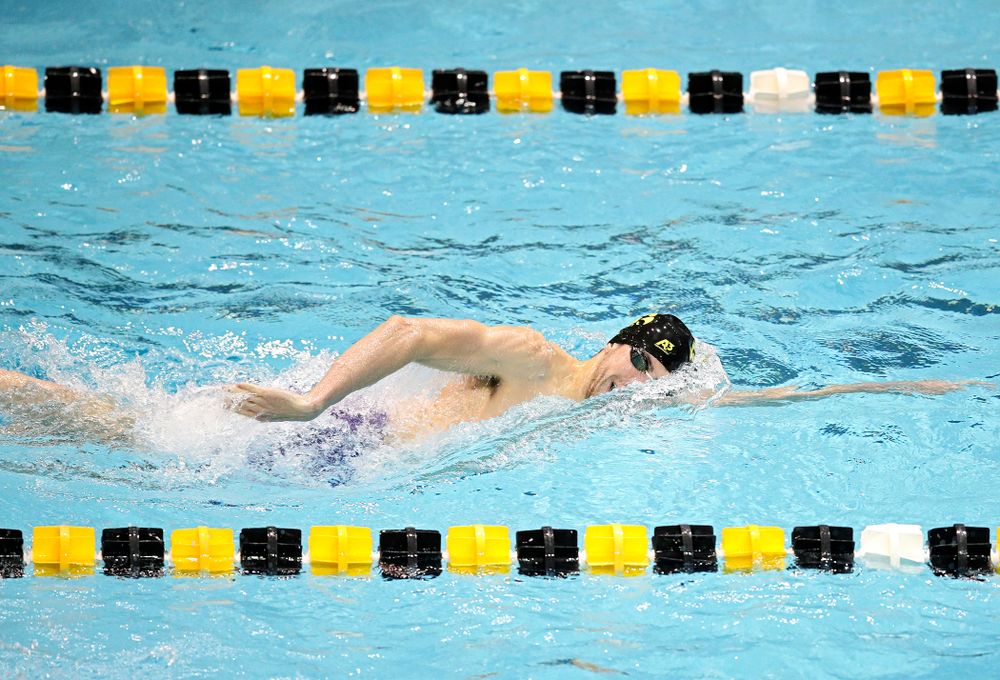 Iowa’s Weston Credit swims the men’s 200 yard freestyle event during their meet at the Campus Recreation and Wellness Center in Iowa City on Friday, February 7, 2020. (Stephen Mally/hawkeyesports.com)