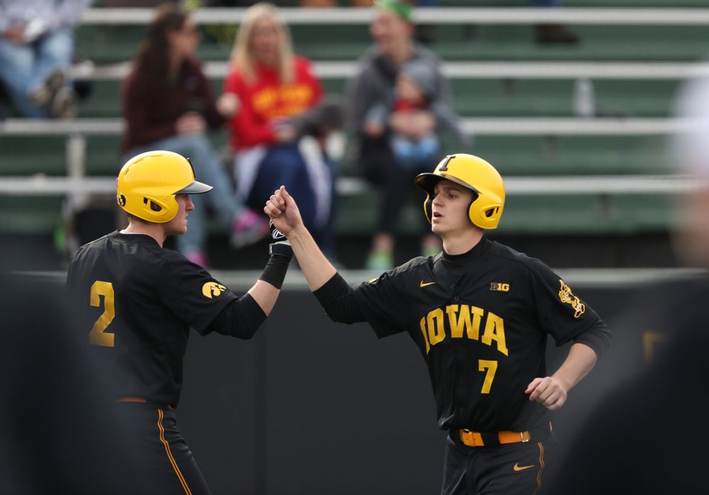 Iowa Hawkeyes Grant Judkins (7) and infielder Brendan Sher (2) against Simpson College Tuesday, March 19, 2019 at Duane Banks Field. (Brian Ray/hawkeyesports.com)