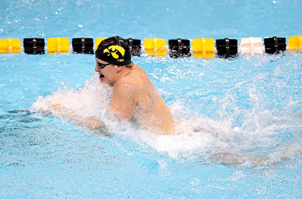 Iowa’s William Myhre swims the men’s 100 yard individual medley event during their meet at the Campus Recreation and Wellness Center in Iowa City on Friday, February 7, 2020. (Stephen Mally/hawkeyesports.com)