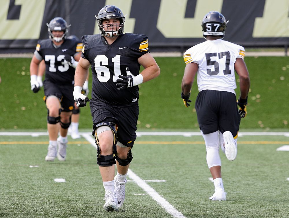 Iowa Hawkeyes offensive lineman Cole Banwart (61) warms up during Fall Camp Practice No. 13 at the Hansen Football Performance Center in Iowa City on Friday, Aug 16, 2019. (Stephen Mally/hawkeyesports.com)