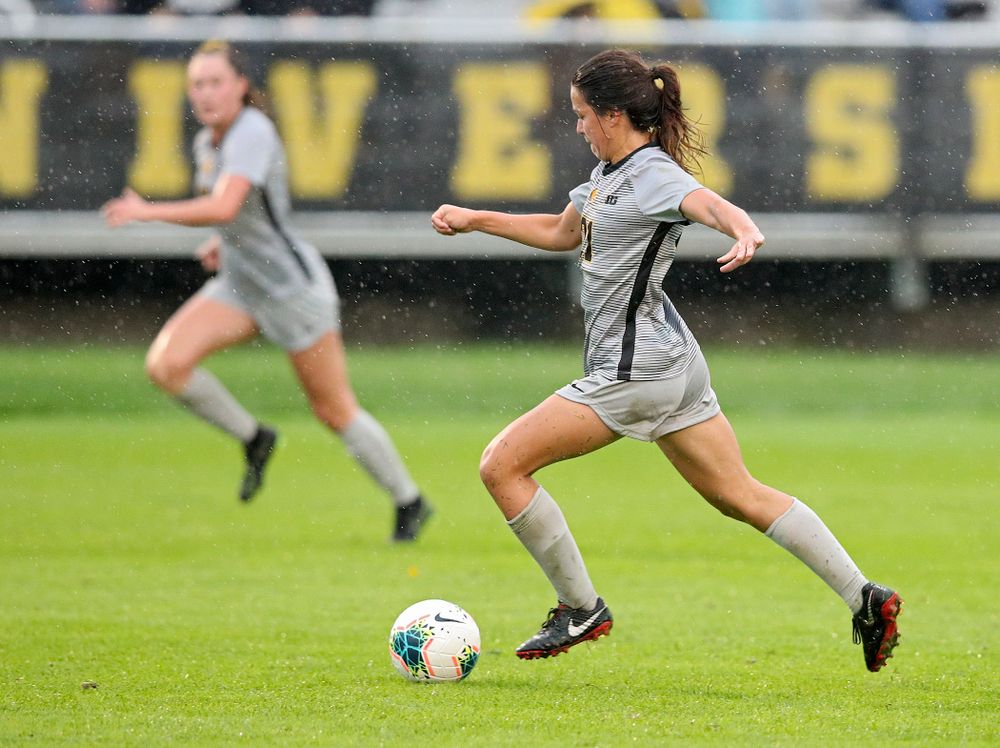 Iowa forward Emma Tokuyama (21) moves with the ball during the second half of their match at the Iowa Soccer Complex in Iowa City on Sunday, Sep 29, 2019. (Stephen Mally/hawkeyesports.com)