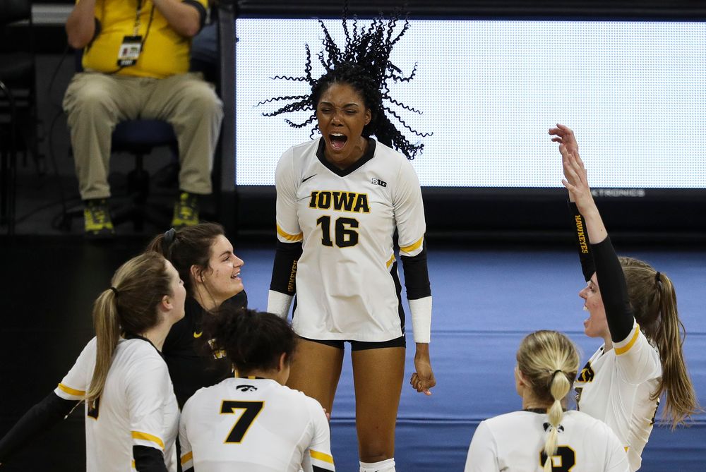 Iowa Hawkeyes outside hitter Taylor Louis (16) celebrates after winning a point during a match against Maryland at Carver-Hawkeye Arena on November 23, 2018. (Tork Mason/hawkeyesports.com)
