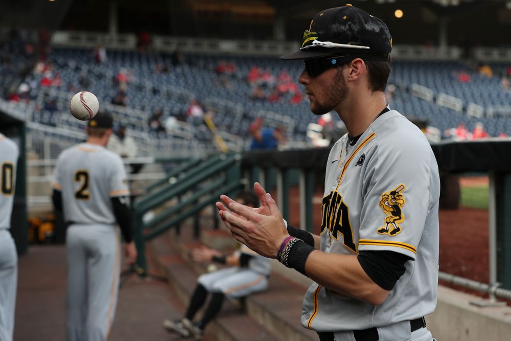 Iowa Hawkeyes outfielder Ben Norman (9) wears special goggles that flicker to improve hand eye coordination before their game against the Indiana Hoosiers in the first round of the Big Ten Baseball Tournament Wednesday, May 22, 2019 at TD Ameritrade Park in Omaha, Neb. (Brian Ray/hawkeyesports.com)