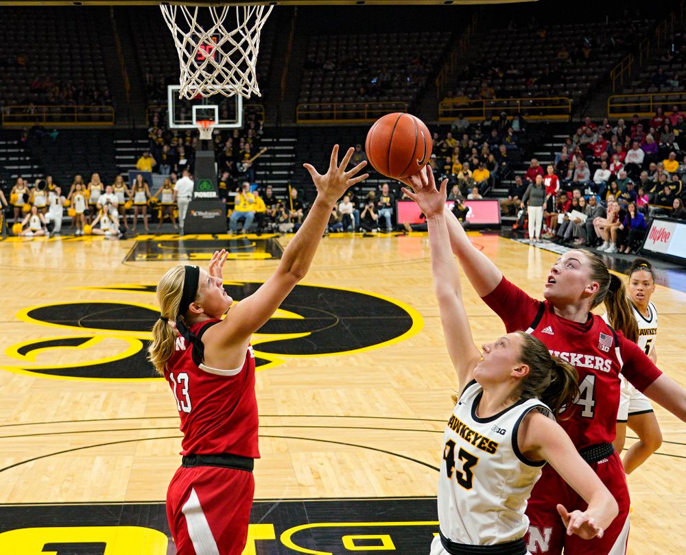 Iowa Hawkeyes forward Amanda Ollinger (43) battles for a rebound during the first quarter of the game at Carver-Hawkeye Arena in Iowa City on Thursday, February 6, 2020. (Stephen Mally/hawkeyesports.com)