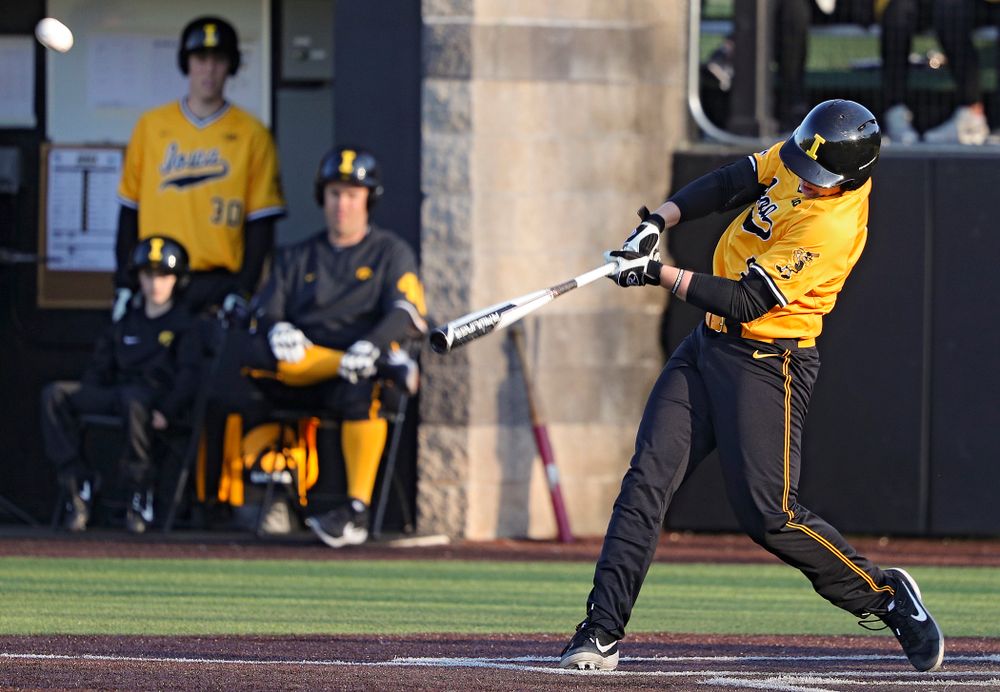 Iowa Hawkeyes pinch hitter Zeb Adreon (5) hits a triple during the seventh inning of their game at Duane Banks Field in Iowa City on Tuesday, Apr. 2, 2019. (Stephen Mally/hawkeyesports.com)