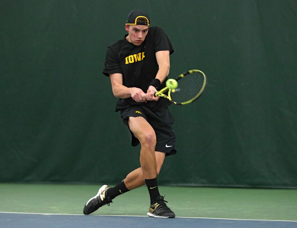Iowa’s Joe Tyler returns a shot during his singles match at the Hawkeye Tennis and Recreation Complex in Iowa City on Friday, March 6, 2020. (Stephen Mally/hawkeyesports.com)