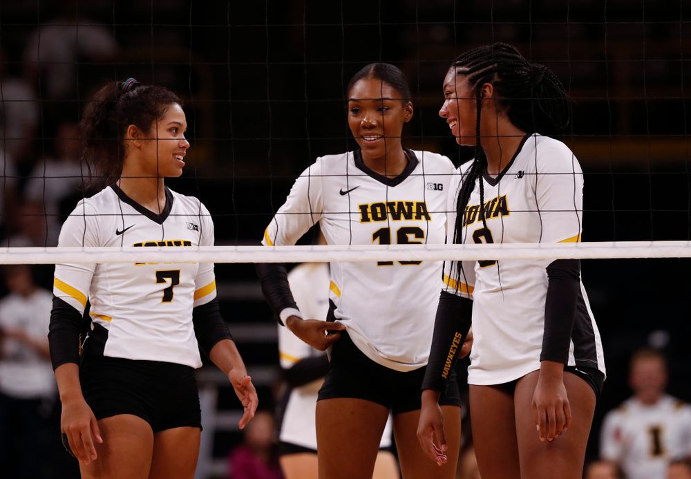 Iowa Hawkeyes setter Gabrielle Orr (7), outside hitter Taylor Louis (16), and middle blocker Amiya Jones (9) against the Michigan State Spartans Friday, September 21, 2018 at Carver-Hawkeye Arena. (Brian Ray/hawkeyesports.com)