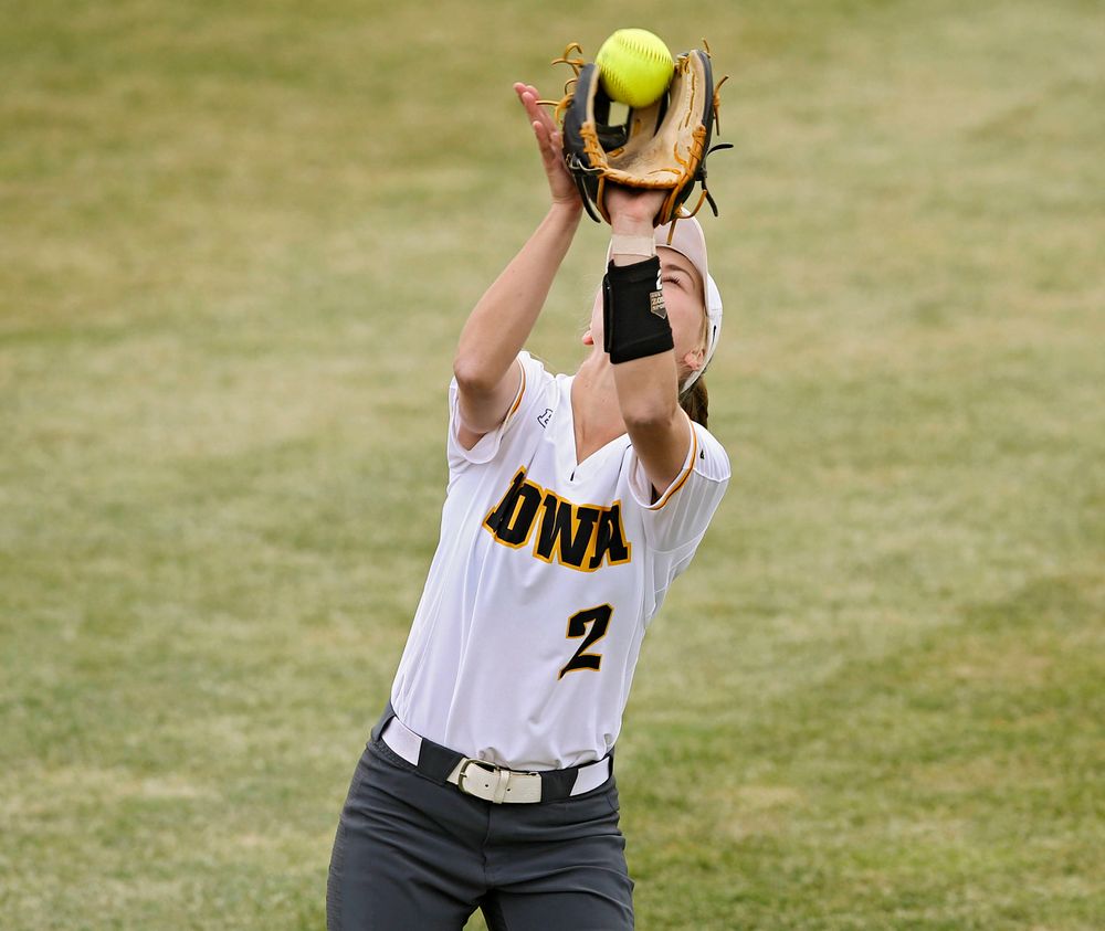 Iowa Hawkeyes Aralee Bogar (2) pulls in a pop up for an out during the fourth inning of their Big Ten Conference softball game at Pearl Field in Iowa City on Friday, Mar. 29, 2019. (Stephen Mally/hawkeyesports.com)