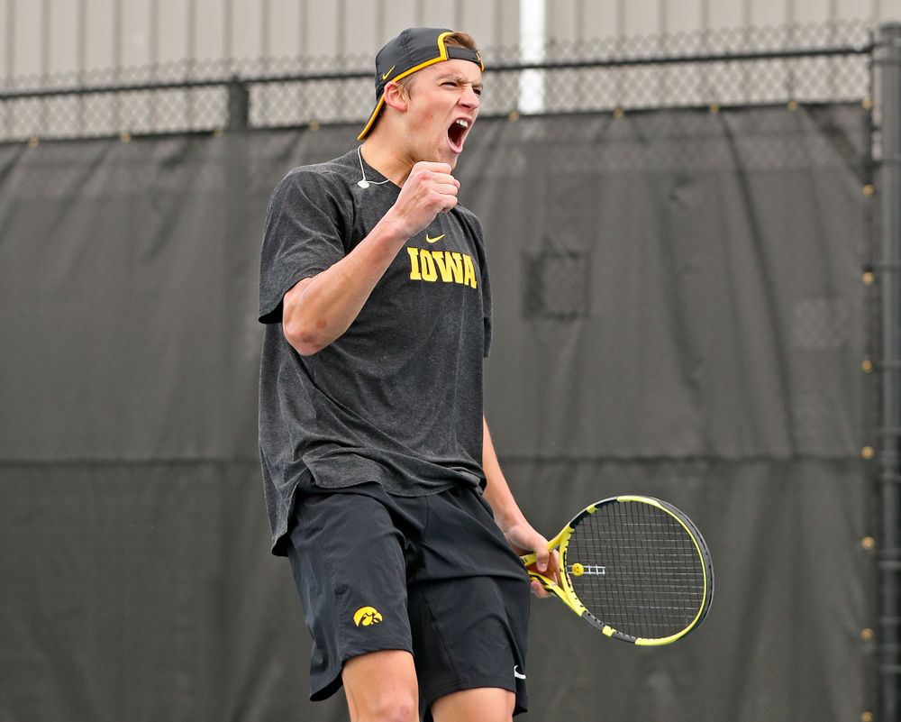 Iowa's Joe Tyler celebrates as he competes during a match against Ohio State at the Hawkeye Tennis and Recreation Complex in Iowa City on Sunday, Apr. 7, 2019. (Stephen Mally/hawkeyesports.com)